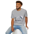 Seated model wearing the Debugging graphic T-shirt in Sport Grey